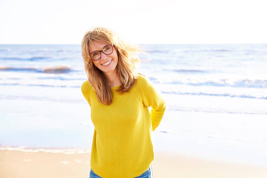 women-smiling-on-beach